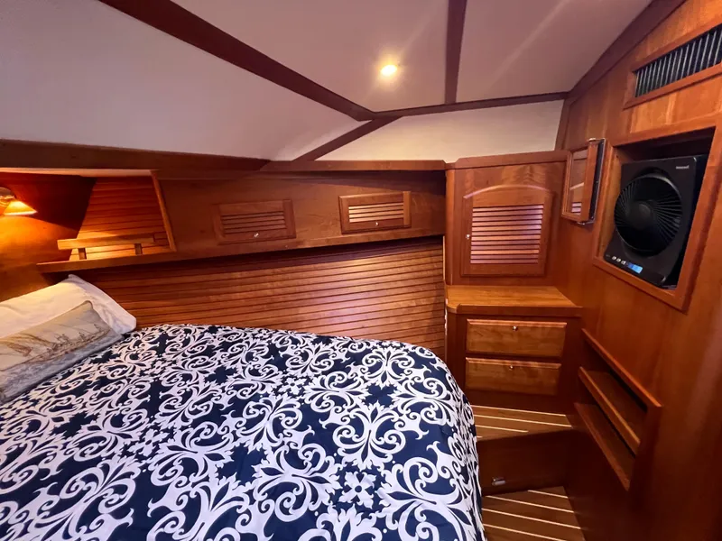 Slide: The Image of Luxurious wood-paneled cabin interior of 2008 Sabre 42 Hard Top Express yacht. - 42
