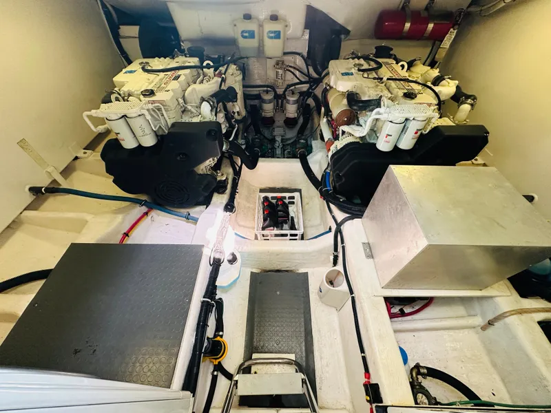 Slide: The Image of Engine room of 2008 Sabre 42 Hardtop Express with dual engines and equipment. - 46