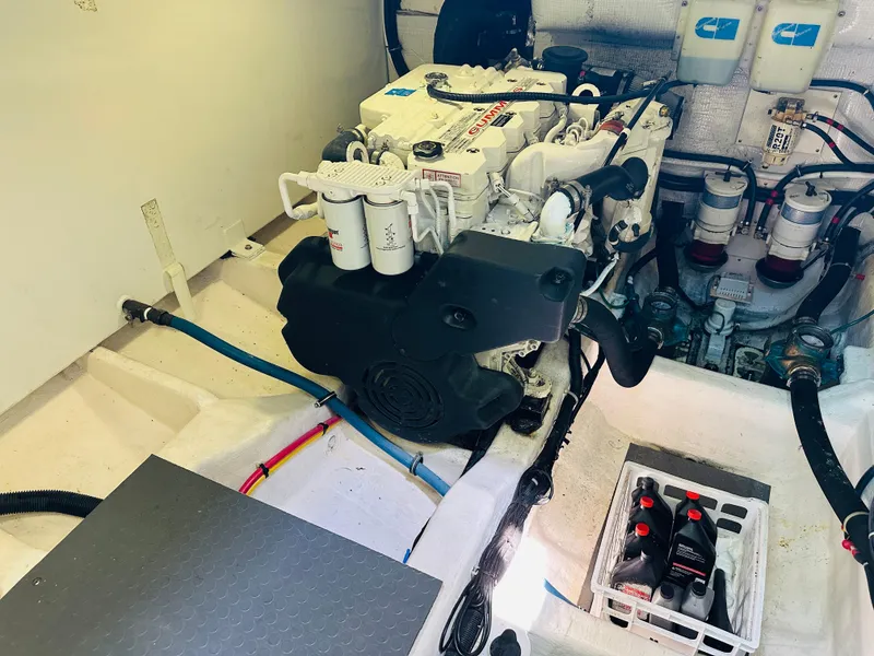 Slide: The Image of Engine room of 2008 Sabre 42 Hardtop Express with visible components and wiring. - 47