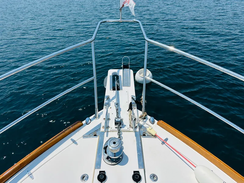 Slide: The Image of Bow view of 2008 Sabre 42 Hardtop Express on calm water. - 8
