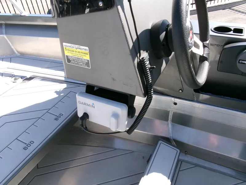 Slide: The Image of 2023 Stabicraft 1550 Frontier Profish boat with Garmin device and steering console. - 13
