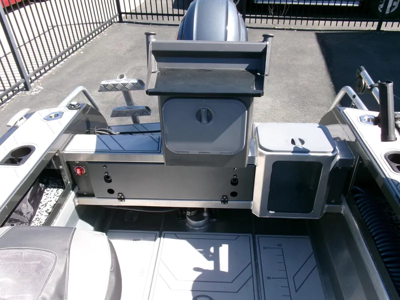 Slide: The Image of 2023 Stabicraft 1550 Frontier Profish series boat interior with seating and storage compartments. - 16
