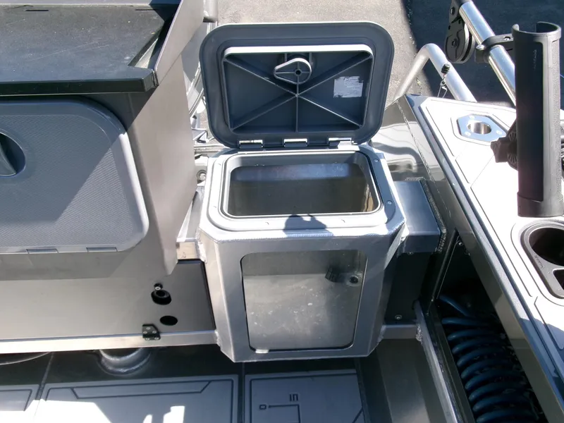 Slide: The Image of 2023 Stabicraft 1550 Frontier Profish series boat with open storage compartment. - 18