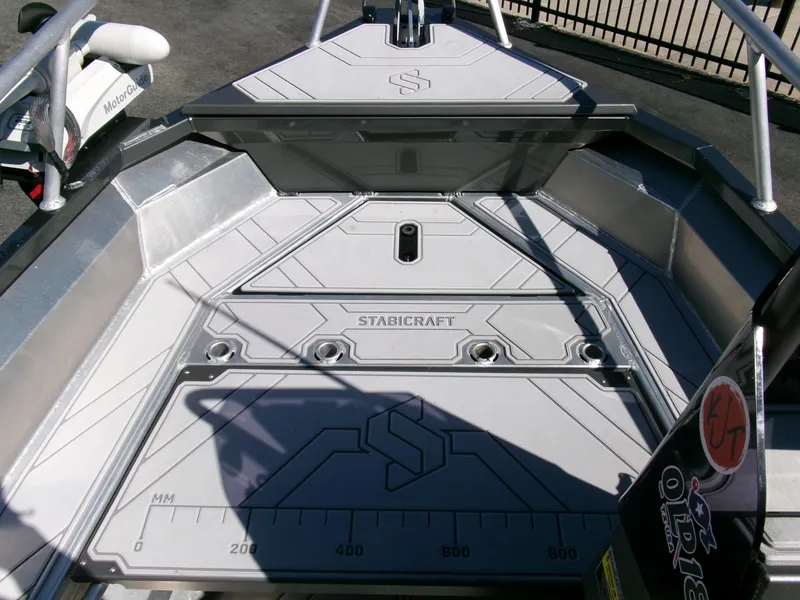 Slide: The Image of 2023 Stabicraft 1550 Frontier Profish series boat deck with storage and measurement markings. - 6