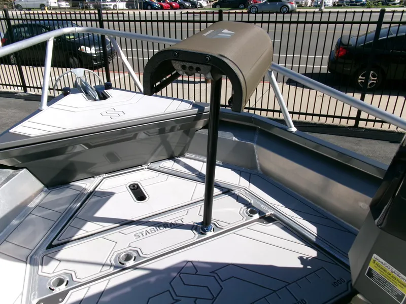 Slide: The Image of 2023 Stabicraft 1550 Frontier Profish series boat deck with seating and railing. - 9