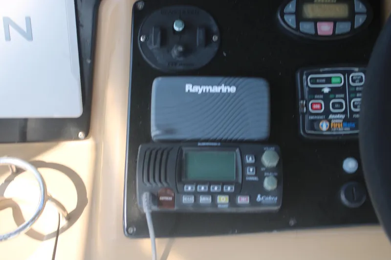Slide: The Image of Control panel of 2004 Carver 360 Sport Sedan with Raymarine equipment. - 25