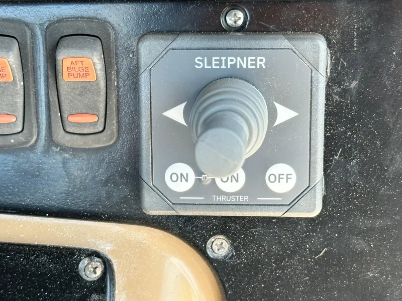 Slide: The Image of Control panel with Sleipner thruster switch on a 2004 Carver 360 Sport Sedan. - 7