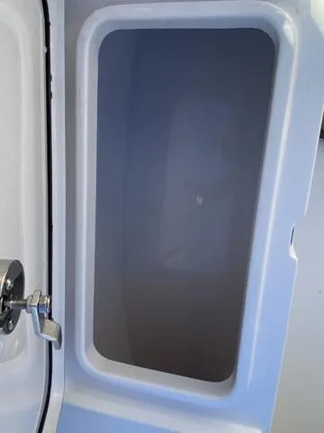Slide: The Image of Open storage compartment on 2020 Sportsman Open 242 boat. - 10