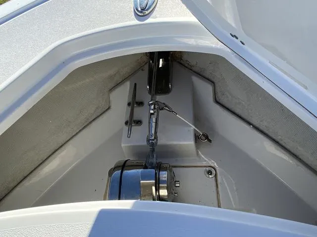 Slide: The Image of 2020 Sportsman Open 242 anchor compartment with stainless steel fittings. - 15