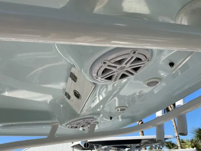 Slide: The Image of 2020 Sportsman Open 242 boat speakers and hatch detail, showcasing sleek design and functionality. - 31