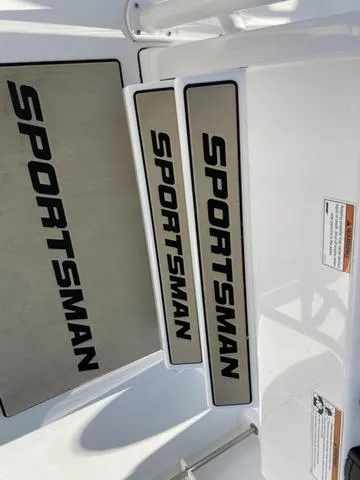 Slide: The Image of 2020 Sportsman Open 242 boat interior with branded non-slip mats. - 34