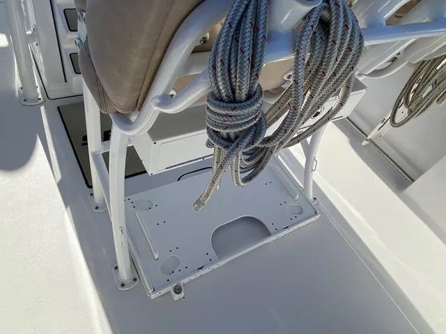 Slide: The Image of 2020 Sportsman Open 242 boat interior with seating and coiled rope. - 36