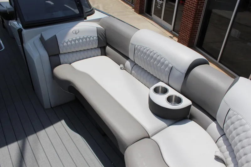 Slide: The Image of Luxurious seating on 2023 Tahoe Pontoon Grand Tahoe 25' with cup holders. - 10