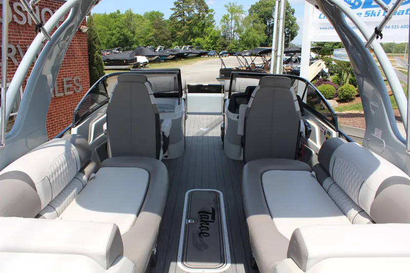 Slide: The Image of 2023 Tahoe Pontoon Grand Tahoe 25' interior with luxurious seating and modern design. - 5