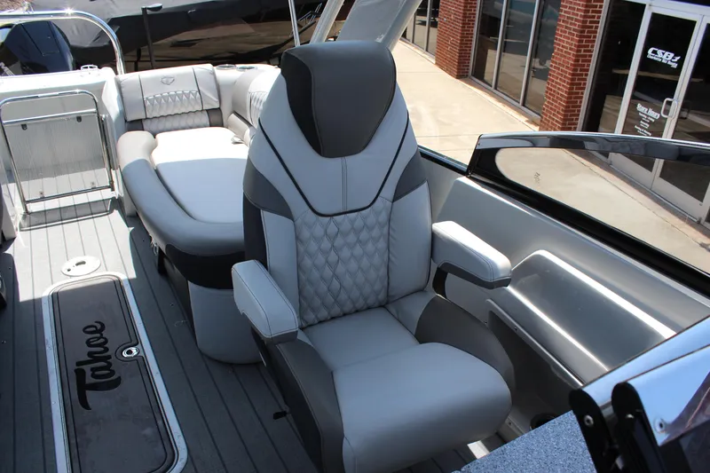 Slide: The Image of 2023 Tahoe Pontoon Grand Tahoe 25' interior with luxurious seating and modern design. - 9