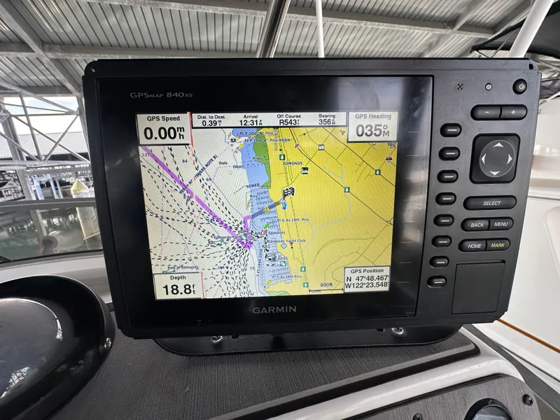 Slide: The Image of Garmin GPS display on 1994 Carver 370 Voyager boat, showing navigation map and data. - 14