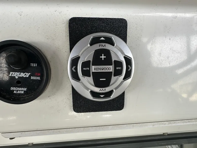 Slide: The Image of Kenwood audio control panel on 1994 Carver 370 Voyager boat dashboard. - 17