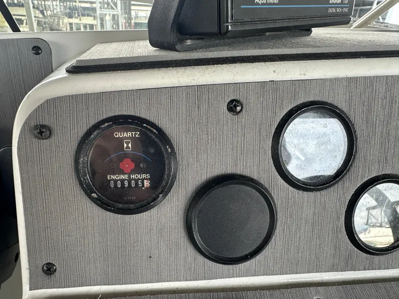 Slide: The Image of Dashboard of 1994 Carver 370 Voyager showing engine hours gauge. - 18