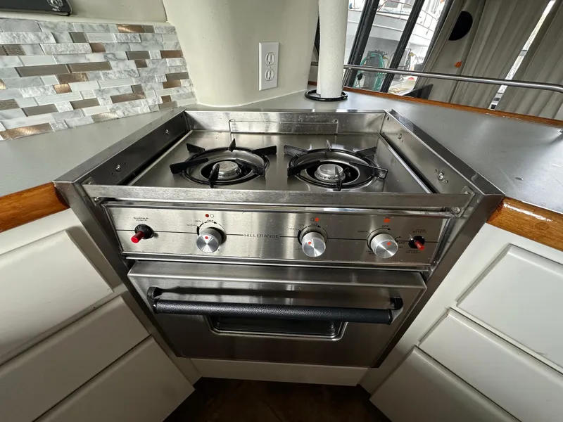Slide: The Image of Stainless steel stove in 1994 Carver 370 Voyager yacht kitchen. - 44