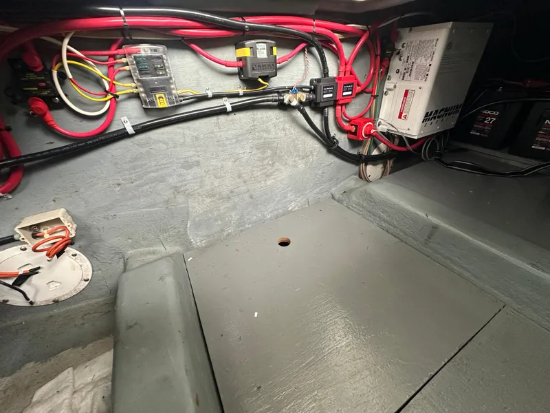 Slide: The Image of Electrical wiring and components inside a 1994 Carver 370 Voyager boat. - 47