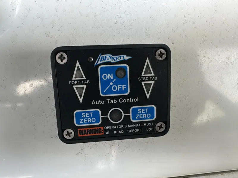 Slide: The Image of Bennett auto tab control panel on 1994 Carver 370 Voyager boat. - 16
