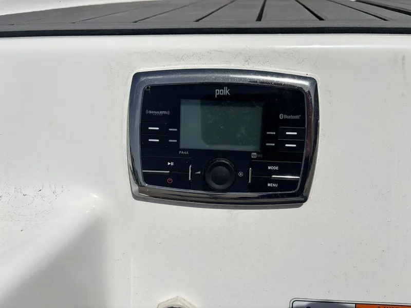 Slide: The Image of Polk audio system on 2017 Yamaha Boats 212 Limited S, featuring Bluetooth and SiriusXM capabilities. - 10
