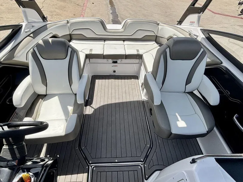 Slide: The Image of 2017 Yamaha Boats 212 Limited S interior with sleek seating and modern design. - 5