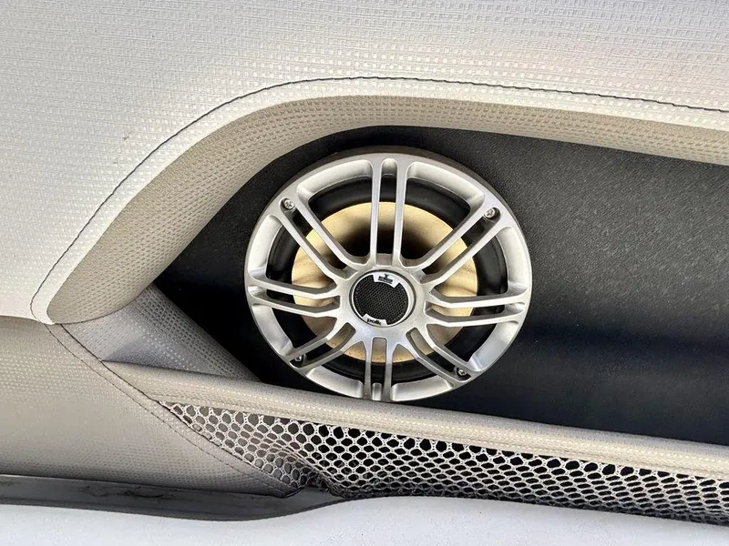 Slide: The Image of Speaker detail on 2017 Yamaha Boats 212 Limited S, featuring sleek design and mesh accents. - 6