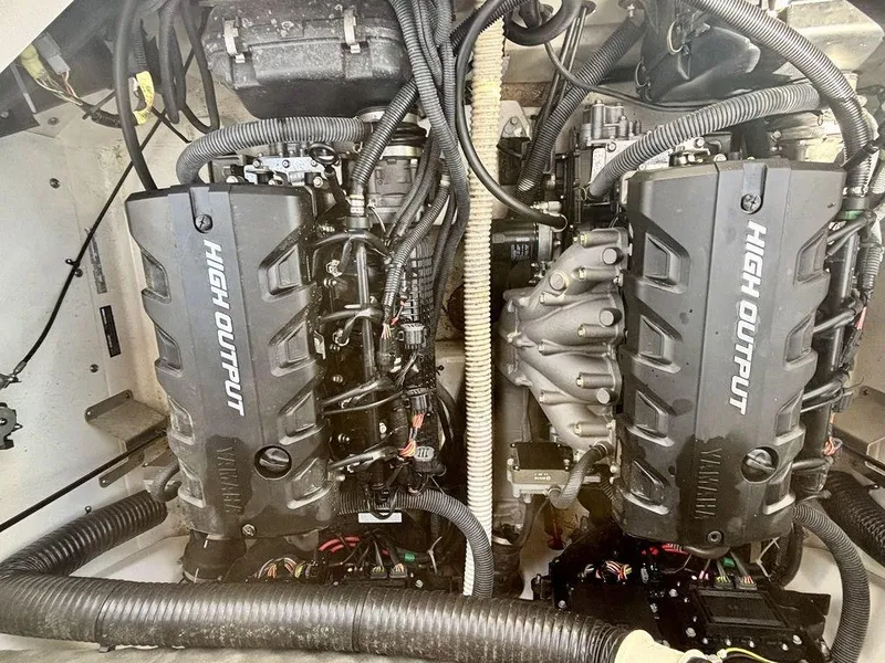 Slide: The Image of 2017 Yamaha Boats 212 Limited S high output engines in engine compartment. - 9