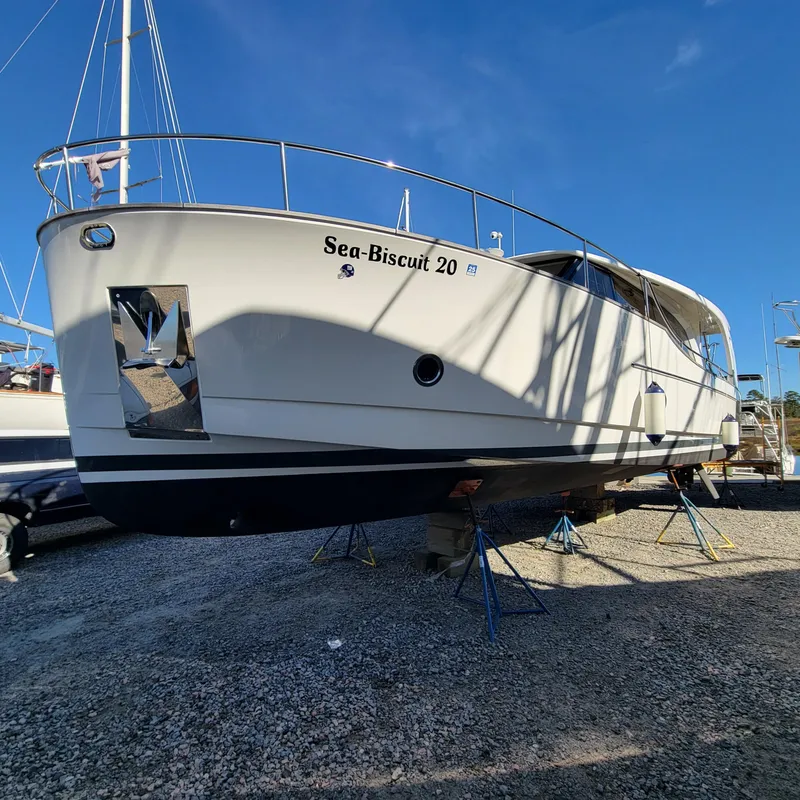 Slide: The Image of 2022 Greenline 40 Hybrid yacht "Sea-Biscuit 20" on stands, sunny day. - 12