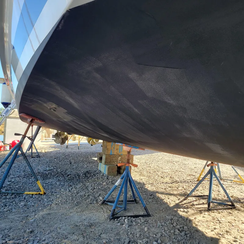 Slide: The Image of 2022 Greenline 40 Hybrid yacht on stands, hull view, outdoor setting. - 14