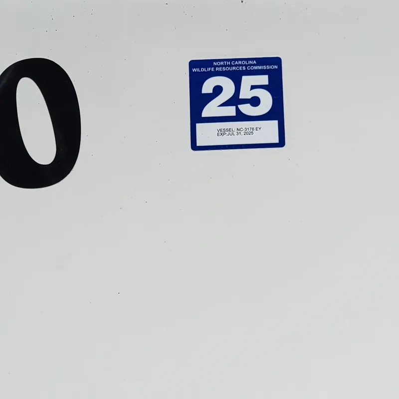 Slide: The Image of North Carolina vessel registration sticker on Greenline 40 Hybrid, 2022 model. - 25