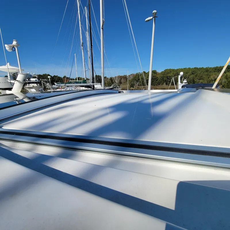 Slide: The Image of 2022 Greenline 40 Hybrid yacht roof with clear blue sky background. - 33
