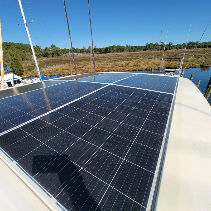 Slide: The Image of Solar panels on 2022 Greenline 40 Hybrid yacht under clear blue sky. - 34