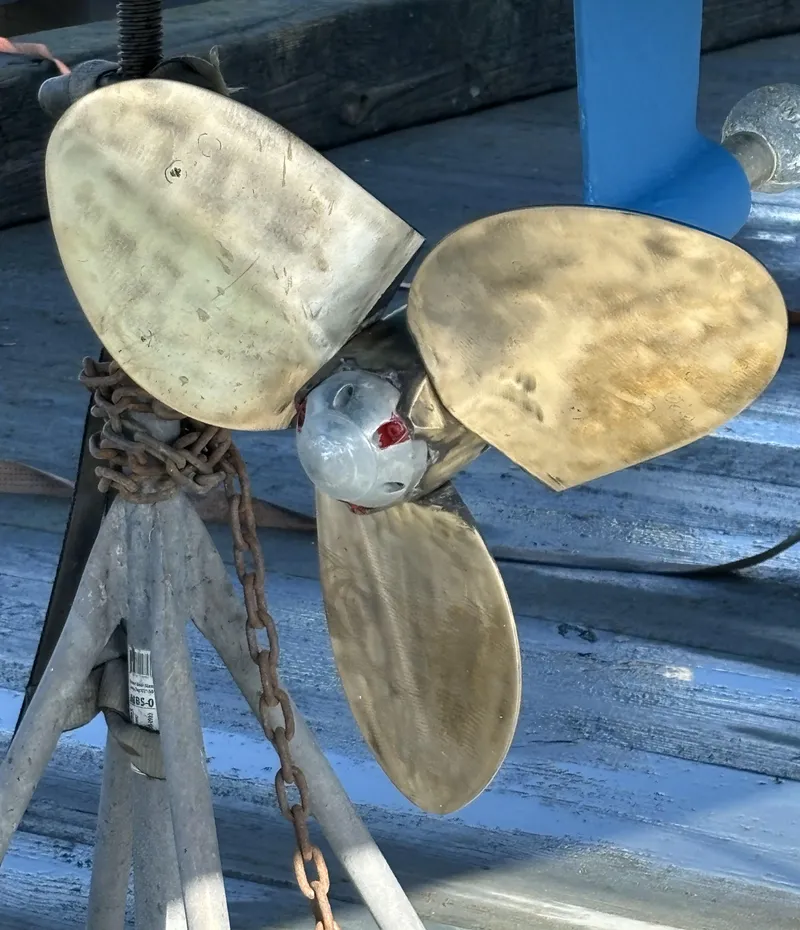 Slide: The Image of Propeller of 2005 Hunter 41 Deck Salon sailboat on a stand. - 34