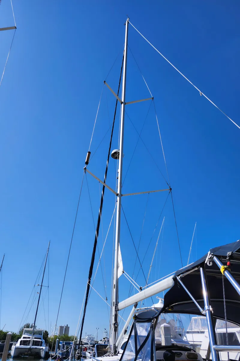 Slide: The Image of Sailboat mast of 2005 Hunter 41 Deck Salon against clear blue sky. - 6