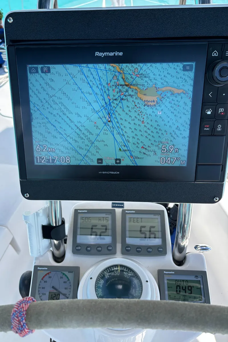 Slide: The Image of Navigation system on 2005 Hunter 41 Deck Salon sailboat, displaying nautical charts and instruments. - 8