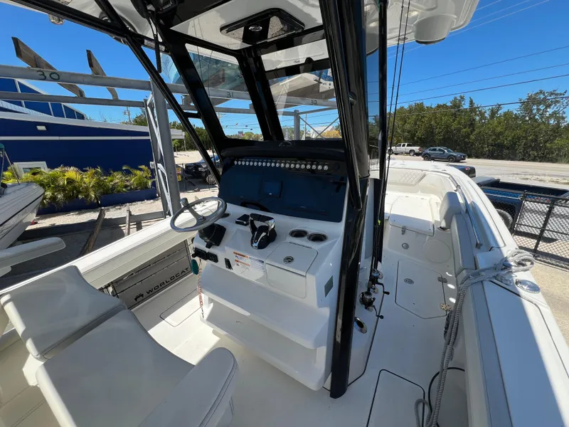 Slide: The Image of 2024 World Cat 260 CC-X boat interior with modern helm and seating. - 20