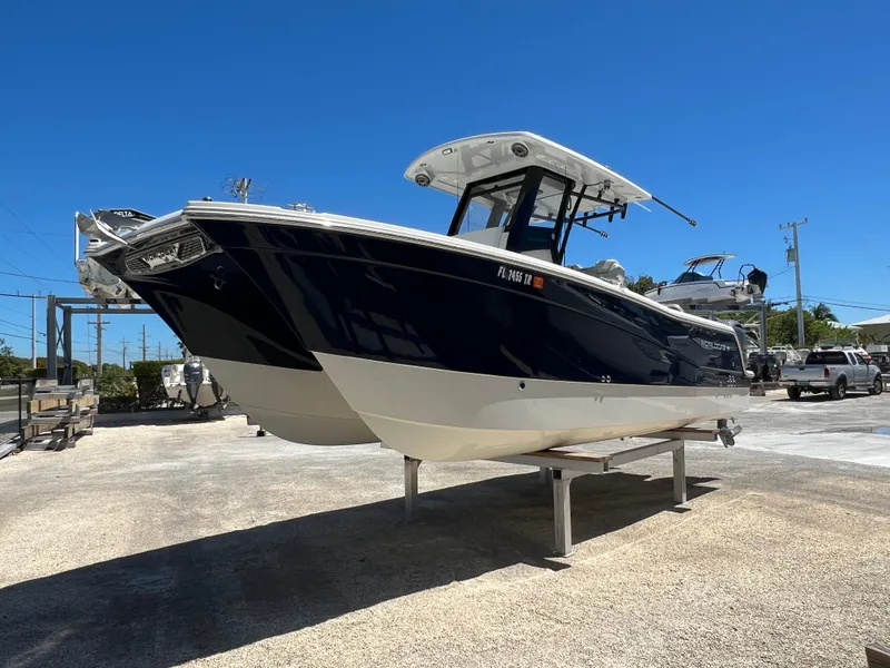 Slide: The Image of 2024 World Cat 260 CC-X boat on display, featuring sleek design and modern features. - 9