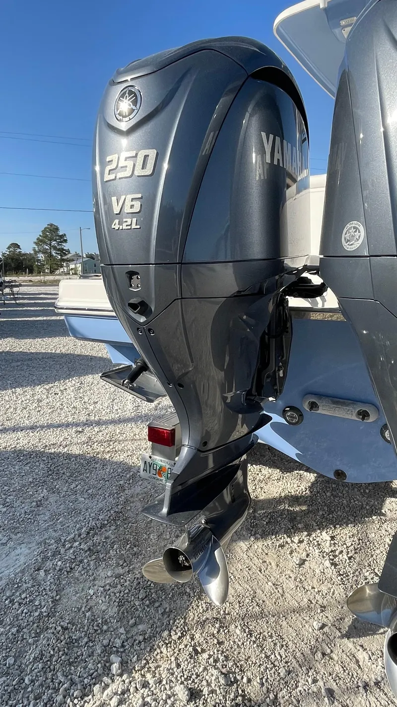 Slide: The Image of 2023 Robalo R272 Center Console with Yamaha 250 V6 outboard engines. - 12