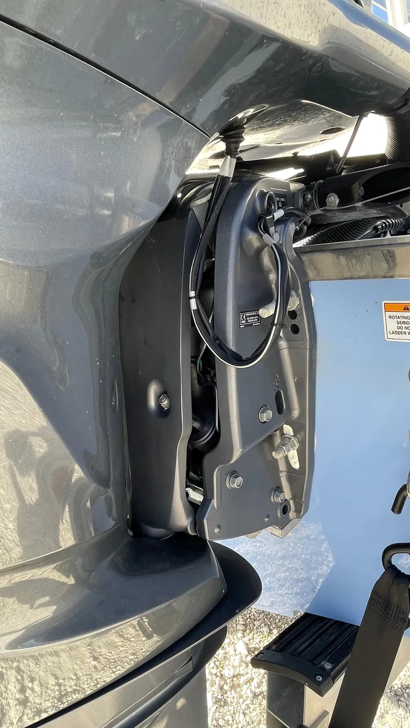 Slide: The Image of 2023 Robalo R272 Center Console boat engine detail. - 17