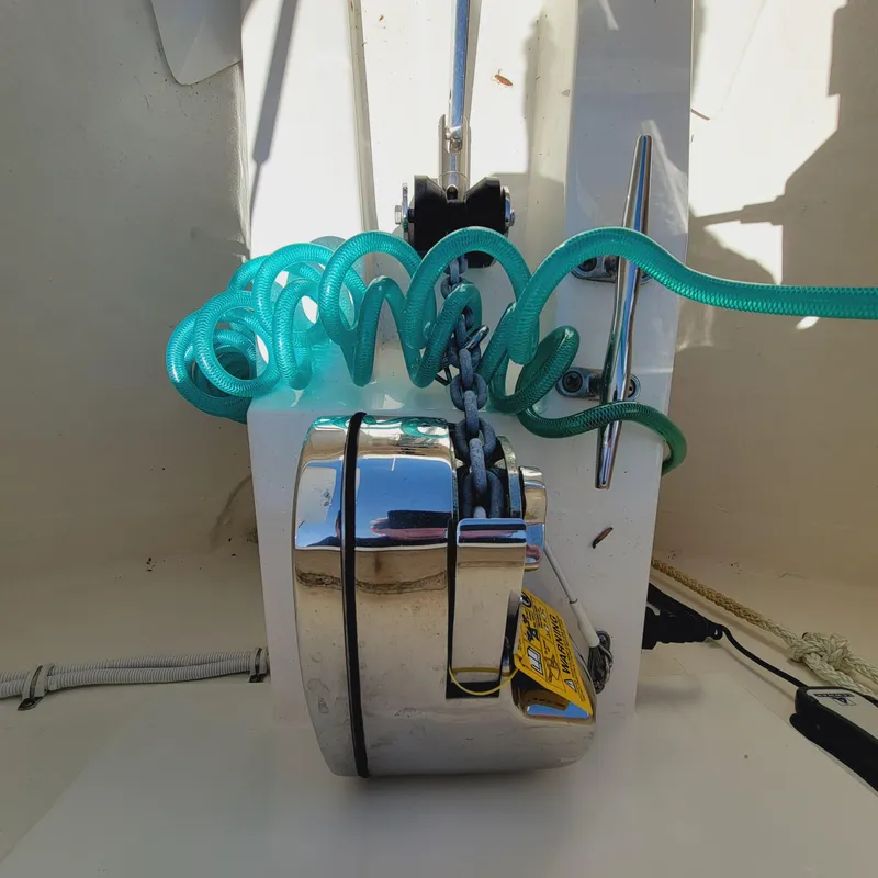 Slide: The Image of Anchor winch with teal rope on 2021 Tiara Yachts 38 LS boat. - 49
