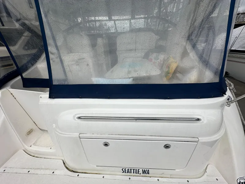 Slide: The Image of 2005 Bayliner 305 boat with covered cockpit, located in Seattle, WA. - 6