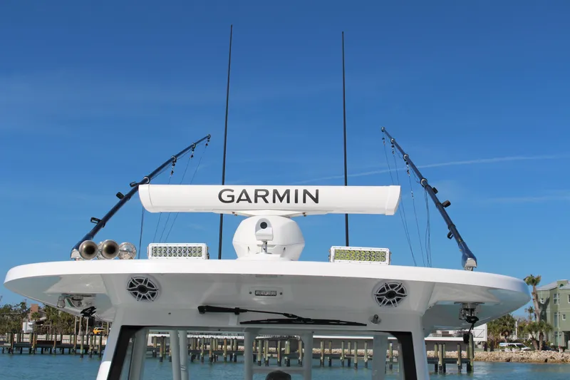 Slide: The Image of Luxurious seating on 2024 Everglades 395 Center Console boat, featuring plush gray and white upholstery. - 10