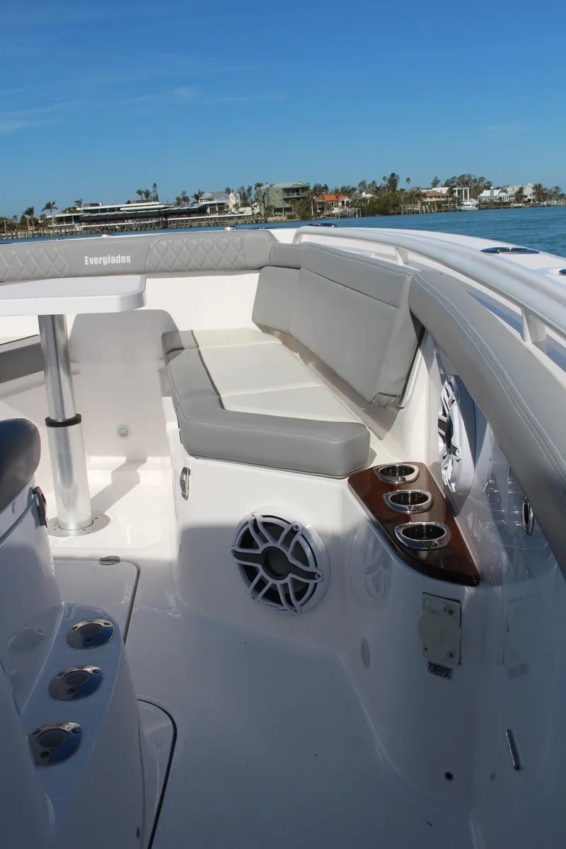 Slide: The Image of 2024 Everglades 395 Center Console interior with speakers and cup holders. - 18