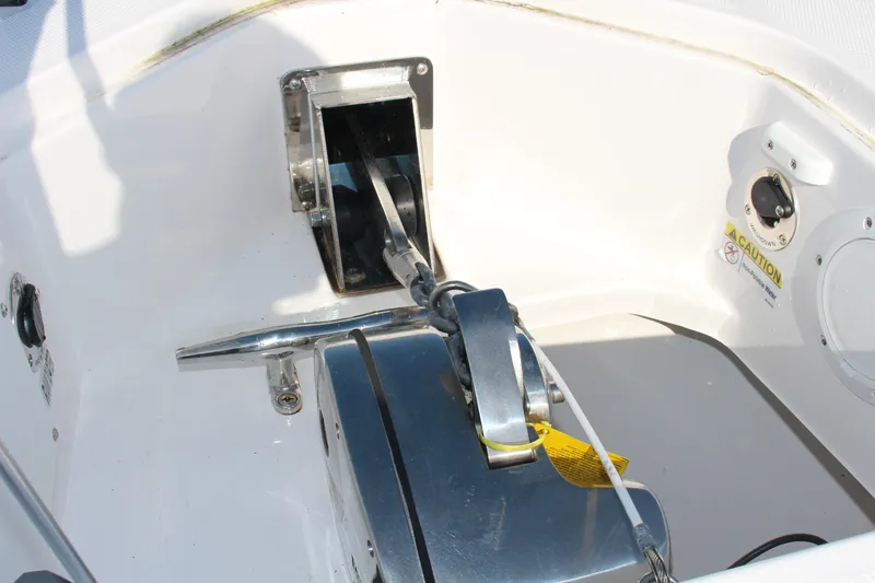 Slide: The Image of 2024 Everglades 395 Center Console boat on calm water, showcasing sleek deck design. - 20