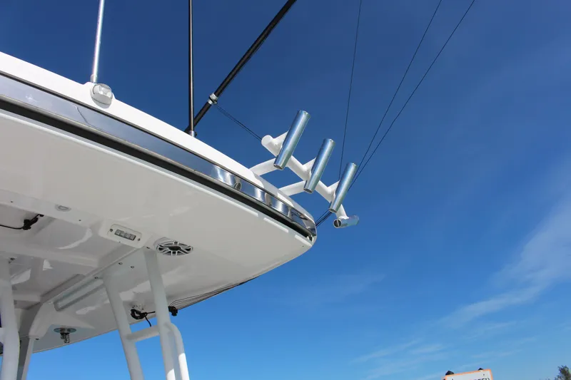 Slide: The Image of 2024 Everglades 395 Center Console storage compartment with open lid and hydraulic supports. - 37