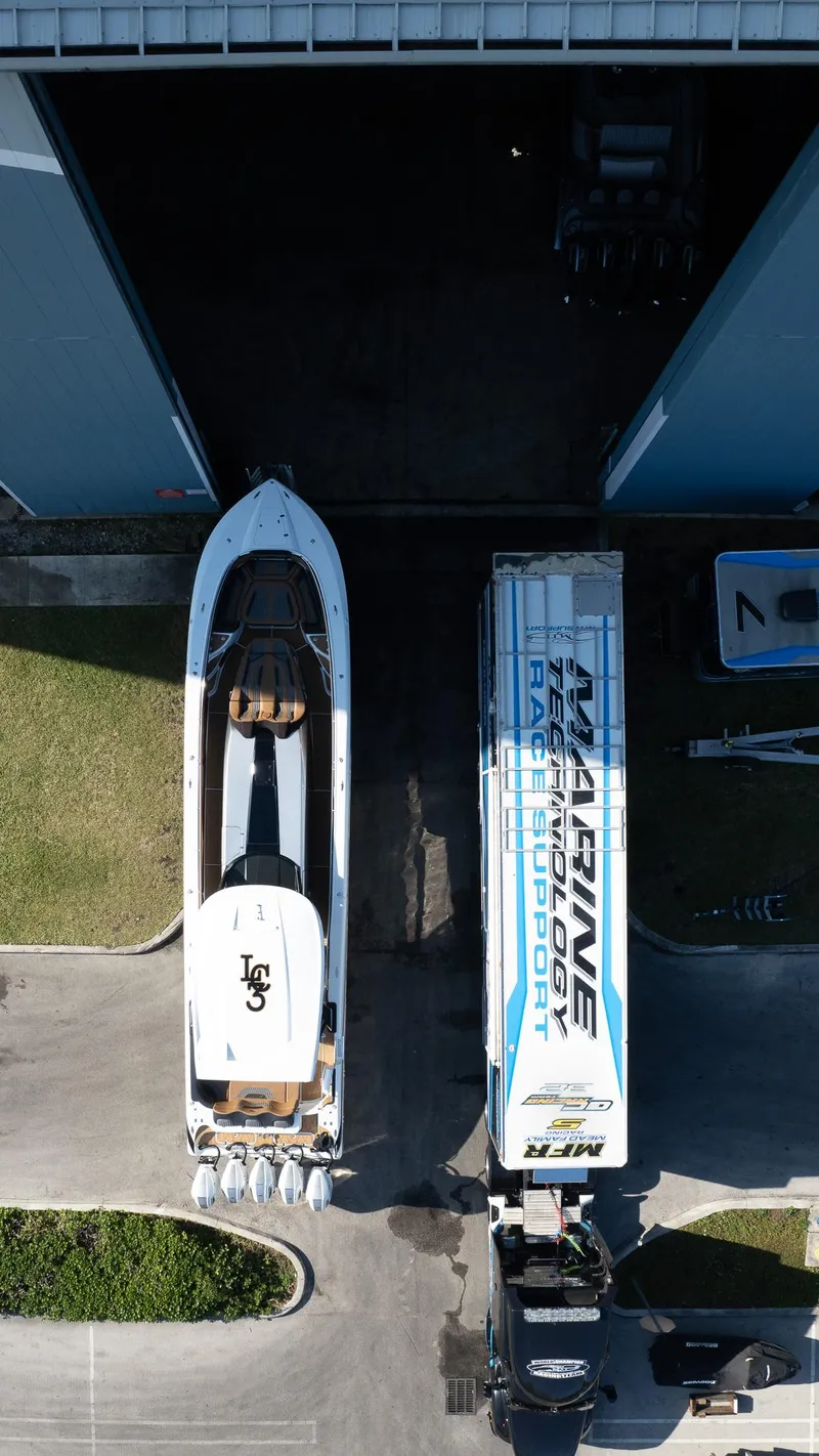 Slide: The Image of Aerial view of MTI V50 boat and trailer in a storage facility, 2022 model. - 38