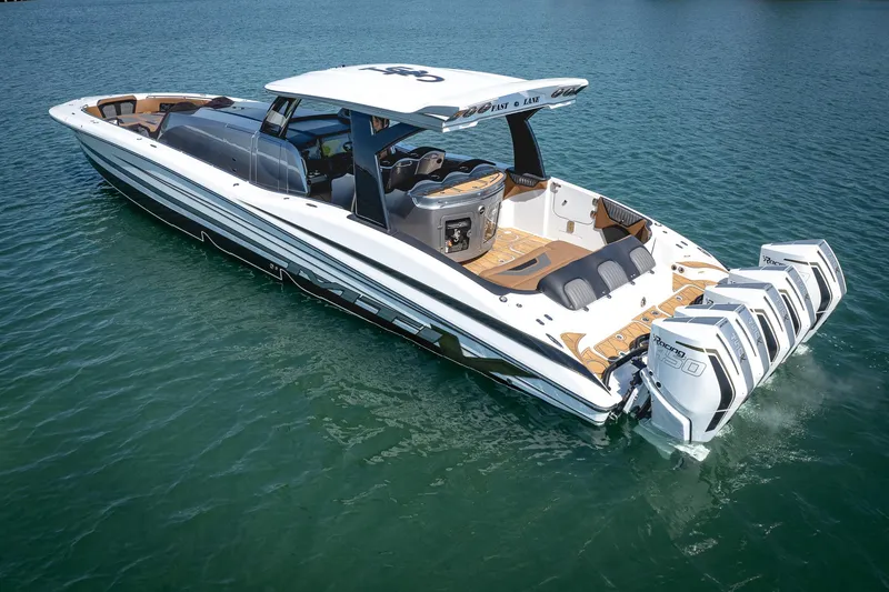 Slide: The Image of Luxury MTI V50 boat, 2022 model, cruising on clear blue water. - 5