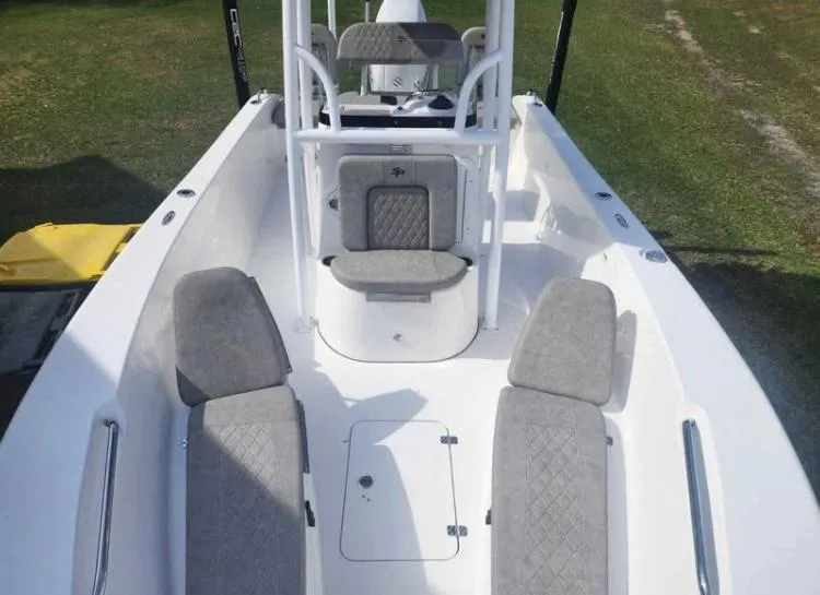Slide: The Image of 2022 Sea Pro 199 Deep V Center Console boat with cushioned seating and center console. - 7